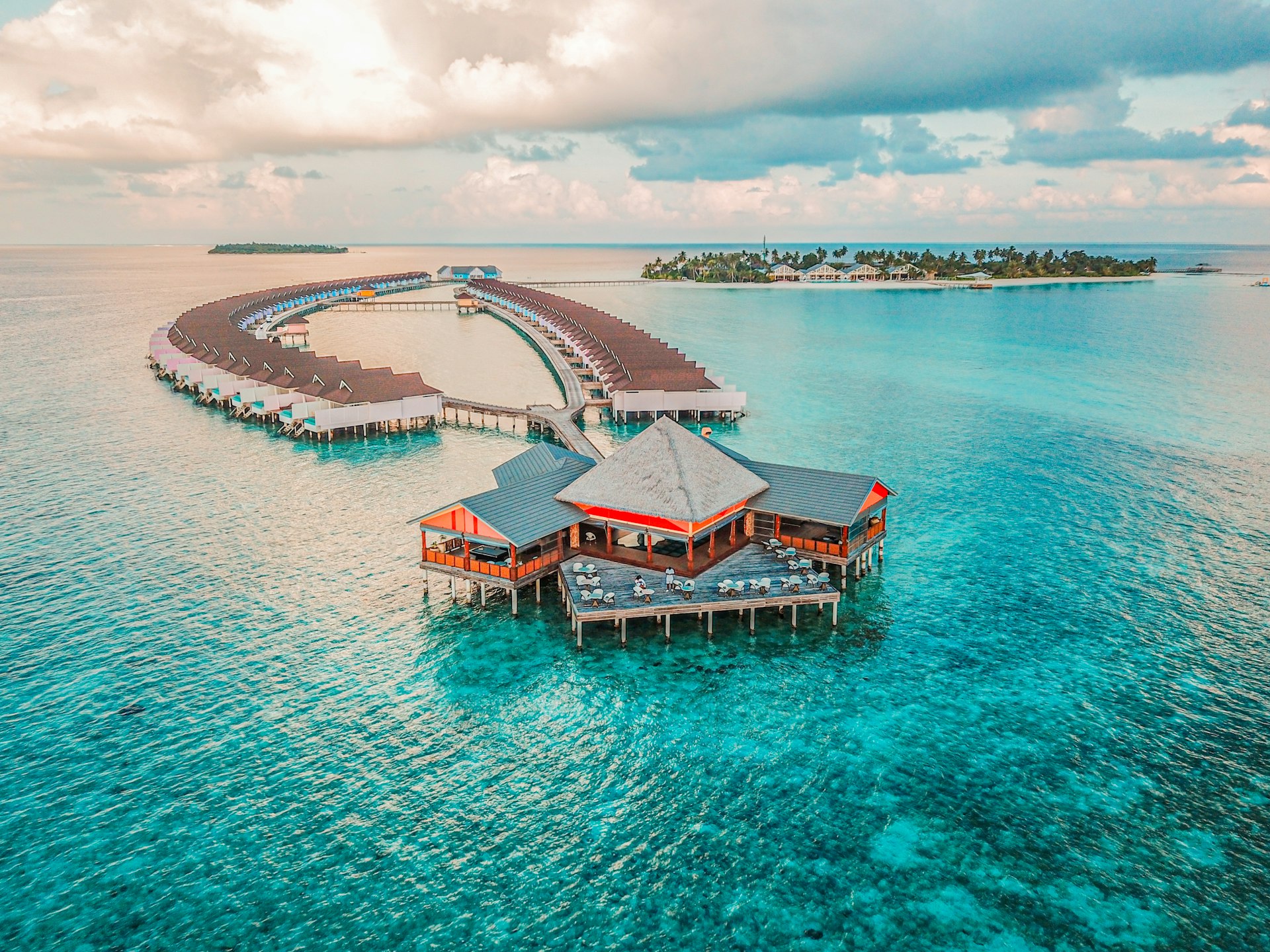 Luxury overwater villas at sunset